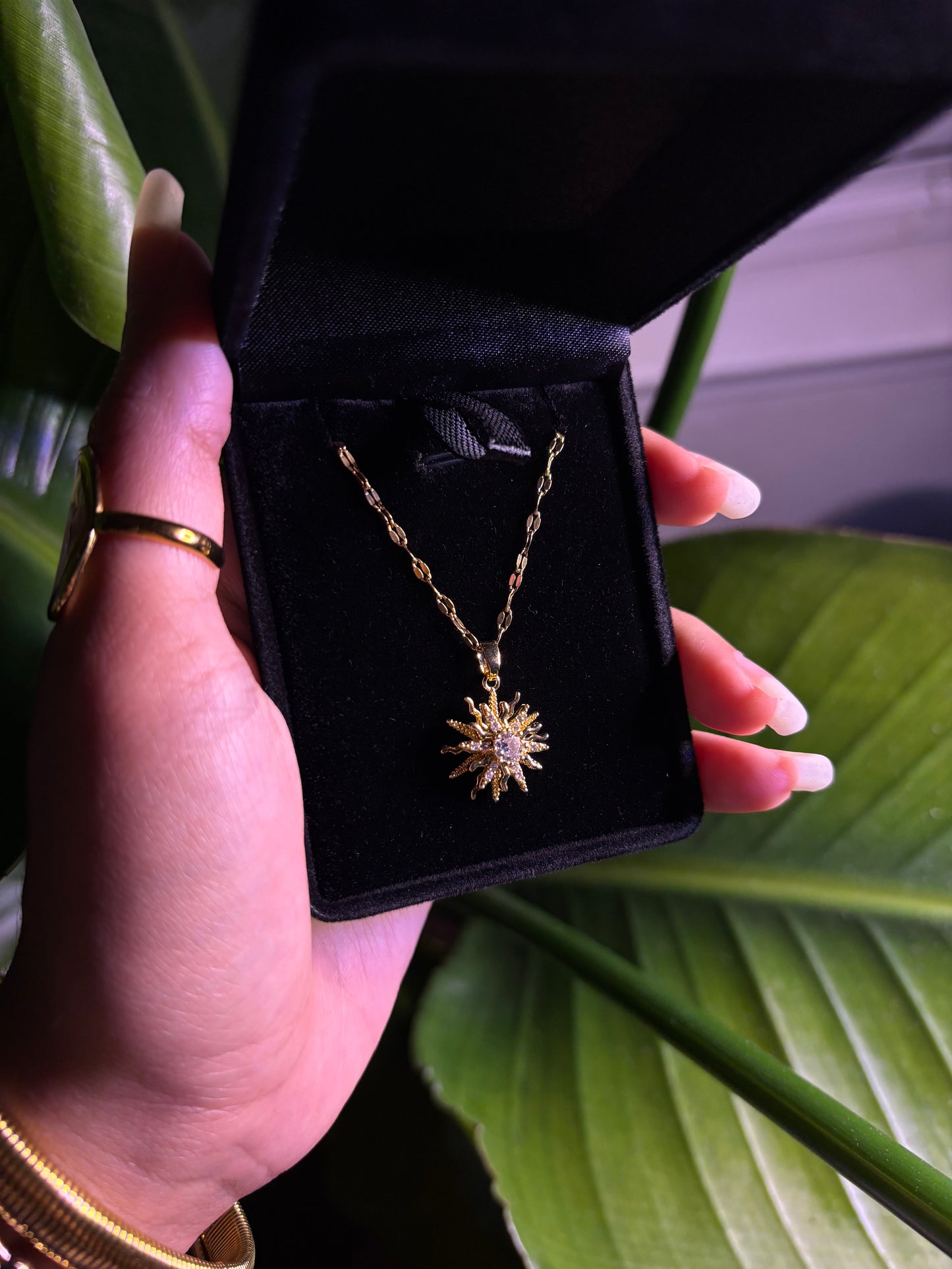 Spinning Gold Sun Necklace