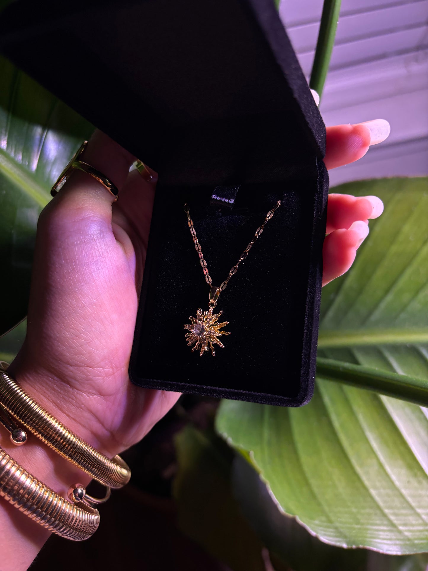 Spinning Gold Sun Necklace